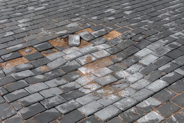 How to fix dips and bumps in your driveway paving