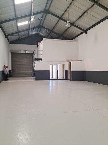 275m2 Industrial Factory Warehouse with small Enclosed Yard Area To Let in the Strand.