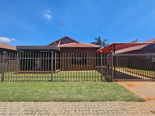 Beautiful 3 bedroom home in a full title security Complex