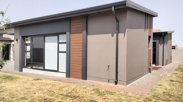 Brand new Modern open plan single storey with three garages