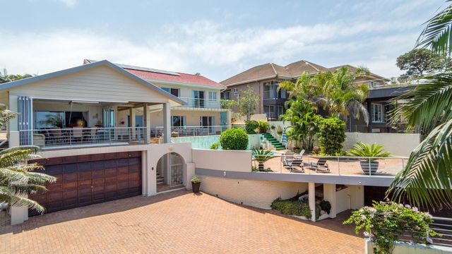 SOLE MANDATE!!!!! Immaculate Family Home in Exclusive Umhlanga Rocks With 2 Bed Cottage and More