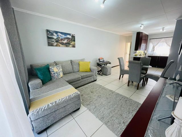 IMMACULATE FIRST FLOOR THREE BEDROOM UNIT UP FOR SALE