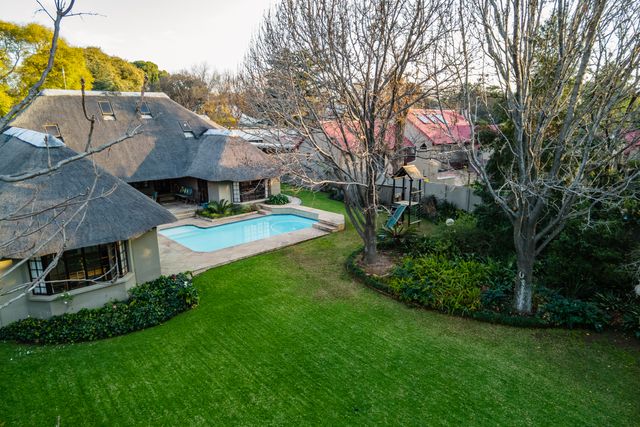 STUNNING FOUR BEDROOM THATCHED HOME IN THE HEART OF RIVONIA