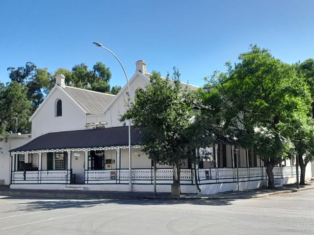 A STATELY HERITAGE BUILDING LOCATED IN THE BEST PART OF GRAAFF-REINET MAIN STREET AND BUSINESS AREA.